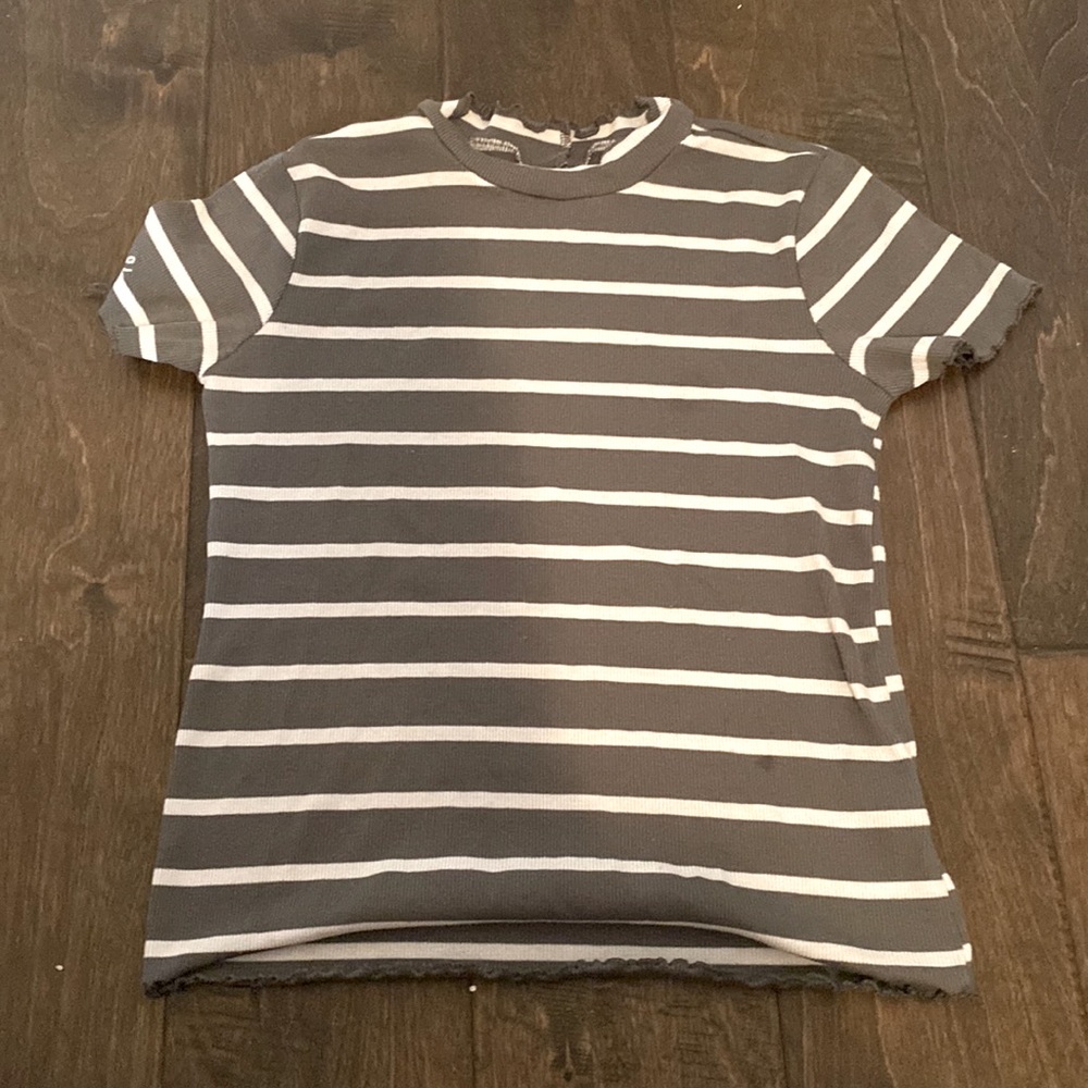 I am selling a striped/a green shirt that and the brand is from Justice.